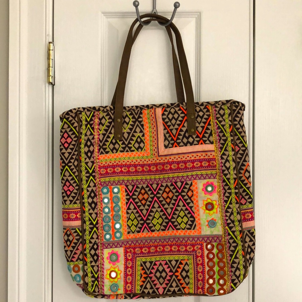 Anthropologie - never used. 17 x 17 inches tall and wide.4.5 inches on bottom.